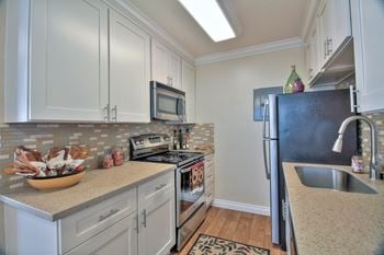 Modern kitchen with stainless steel appliances
